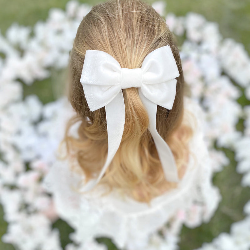 Discover the beautiful Fable Velvet Bow Barrette in Pale Ivory, perfect for flower girls and weddings, Oversize velvet hair bow, Ivory velvet hair bow, velvet hair bow uk, Ivory bow for flower girl, flower girl bow, large velvet bow uk, ivory velvet bow,barrette, hair bow for flower girl, flower girl hair accessories