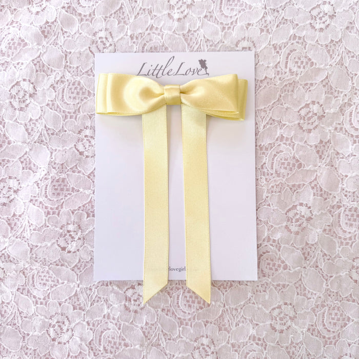 Fleur Satin Bow Barrette in butter yellow, yellow satin bow, lemon yellow hair bow, childrens yellow hair bow, Hair Bow in Butter yellow, lemon yellow hair bow, yellow flower girl, pale yellow bow for hair, childs hair bow in yellow, butter yellow bow