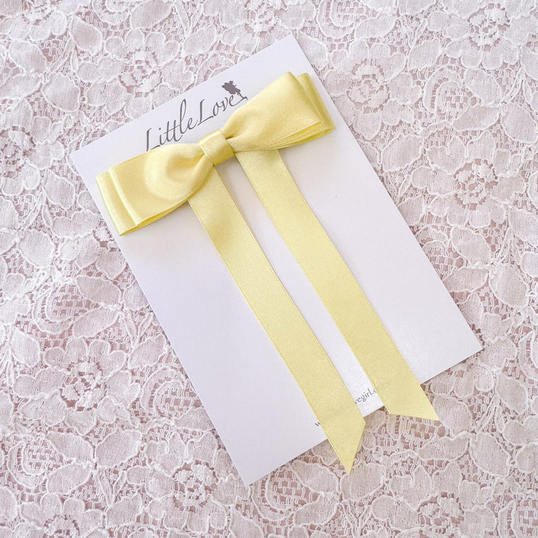 Fleur Satin Bow Barrette in butter yellow, yellow satin bow, lemon yellow hair bow, childrens yellow hair bow, Hair Bow in Butter yellow, lemon yellow hair bow, yellow flower girl, pale yellow bow for hair, childs hair bow in yellow, butter yellow bow