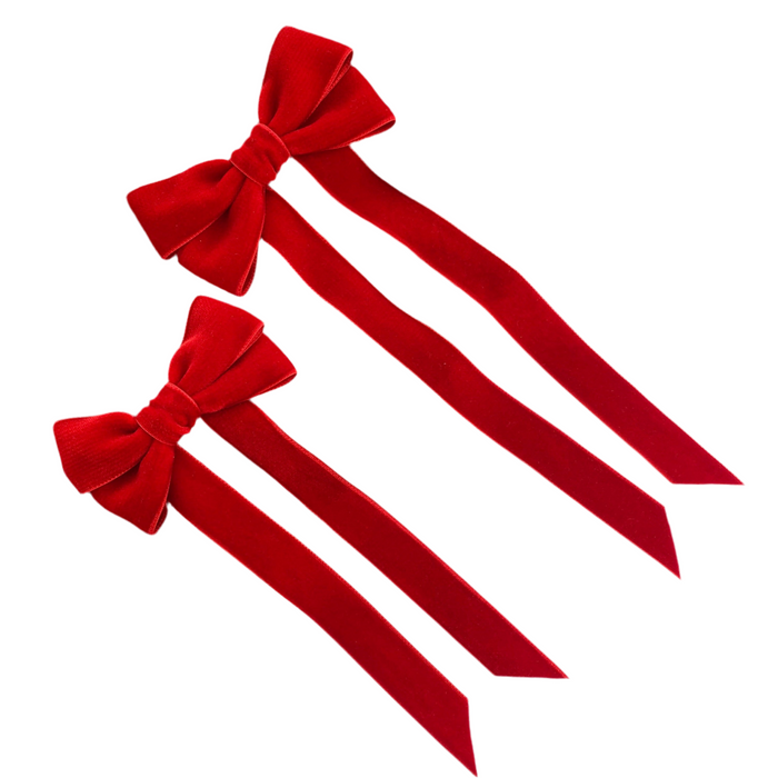
Image shows two red velvet hair bows for hair cut out images on a white background, Little Love 'Ever After' velvet bow hair clip in true red, Velvet Hair Bows, Girls Red Hair bow in velvet in two sizes on white background