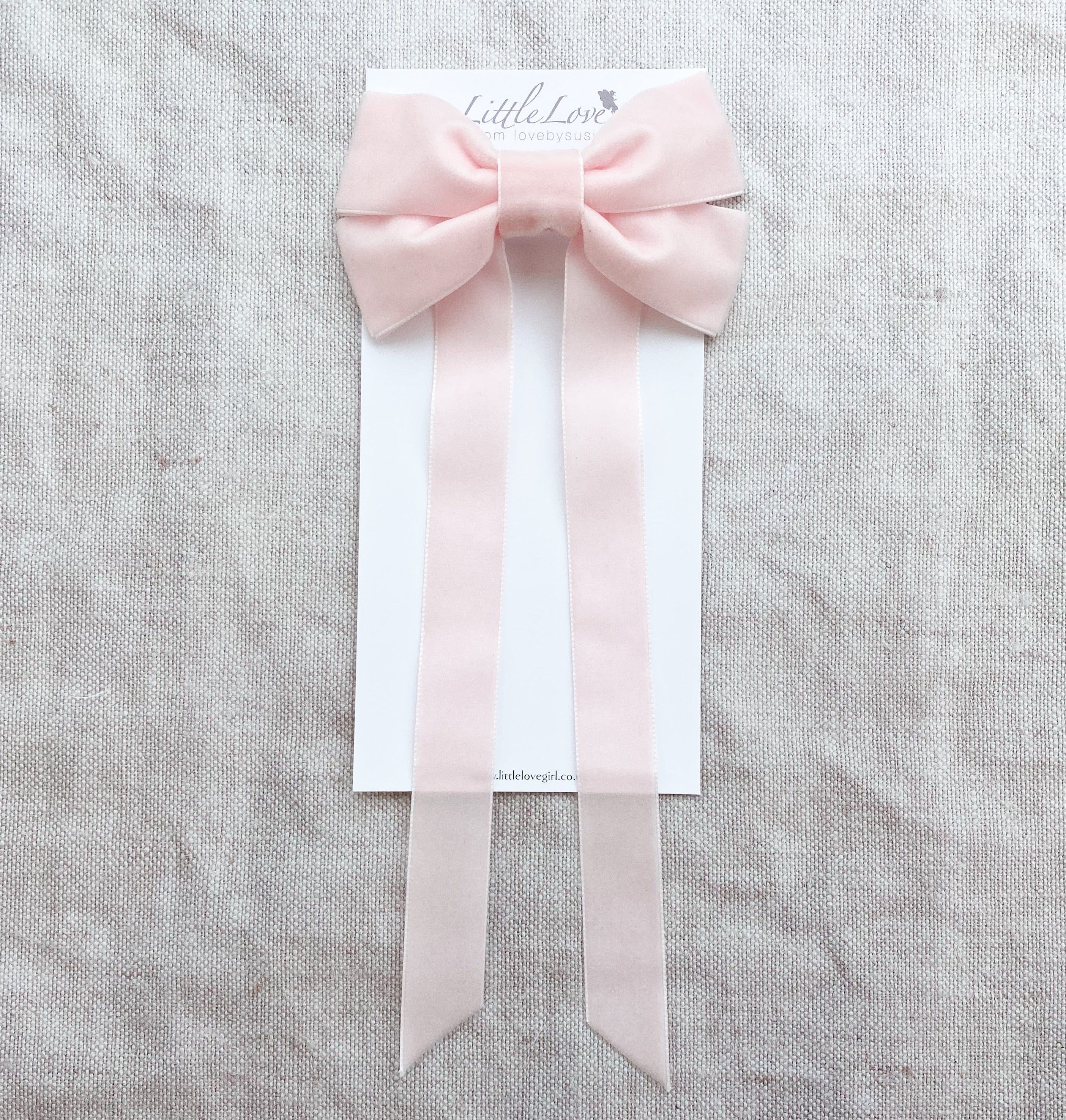 Fable Velvet Bow Barrette in pale pink, Pink Fable bow barrette, flower girl bows, Oversize velvet hair bow, large velvet bow uk, pink velvet bow barrette, hair bow for little  girl, girls wearing hair accessories uk, pink hair bows for little girls 
