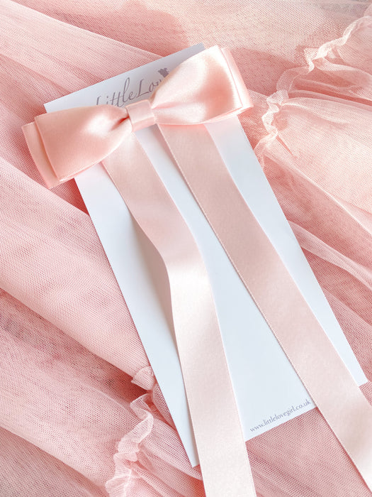 Little Love Fleur Satin Bow Barrette in Pink, Oversize satin hair bow, pale pink satin hair bow, silk satin hair bow uk, pink bow for little girll, flower girl bow satin, large silk bow in hair, pink satin bow on little girl with long hair,  pink satin bow barrette, hair bow in pink satin, little girl wearing pink bow,  pink hair accessory