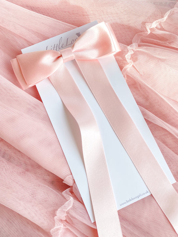 Little Love Fleur Satin Bow Barrette in Pink, Oversize satin hair bow, pale pink satin hair bow, silk satin hair bow uk, pink bow for little girll, flower girl bow satin, large silk bow in hair, pink satin bow on little girl with long hair,  pink satin bow barrette, hair bow in pink satin, little girl wearing pink bow,  pink hair accessory